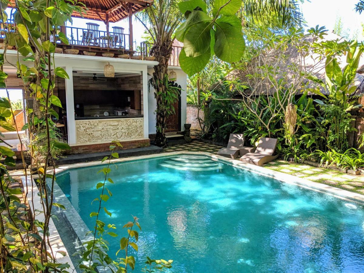 The Laras Villa Jimbaran Buitenkant foto