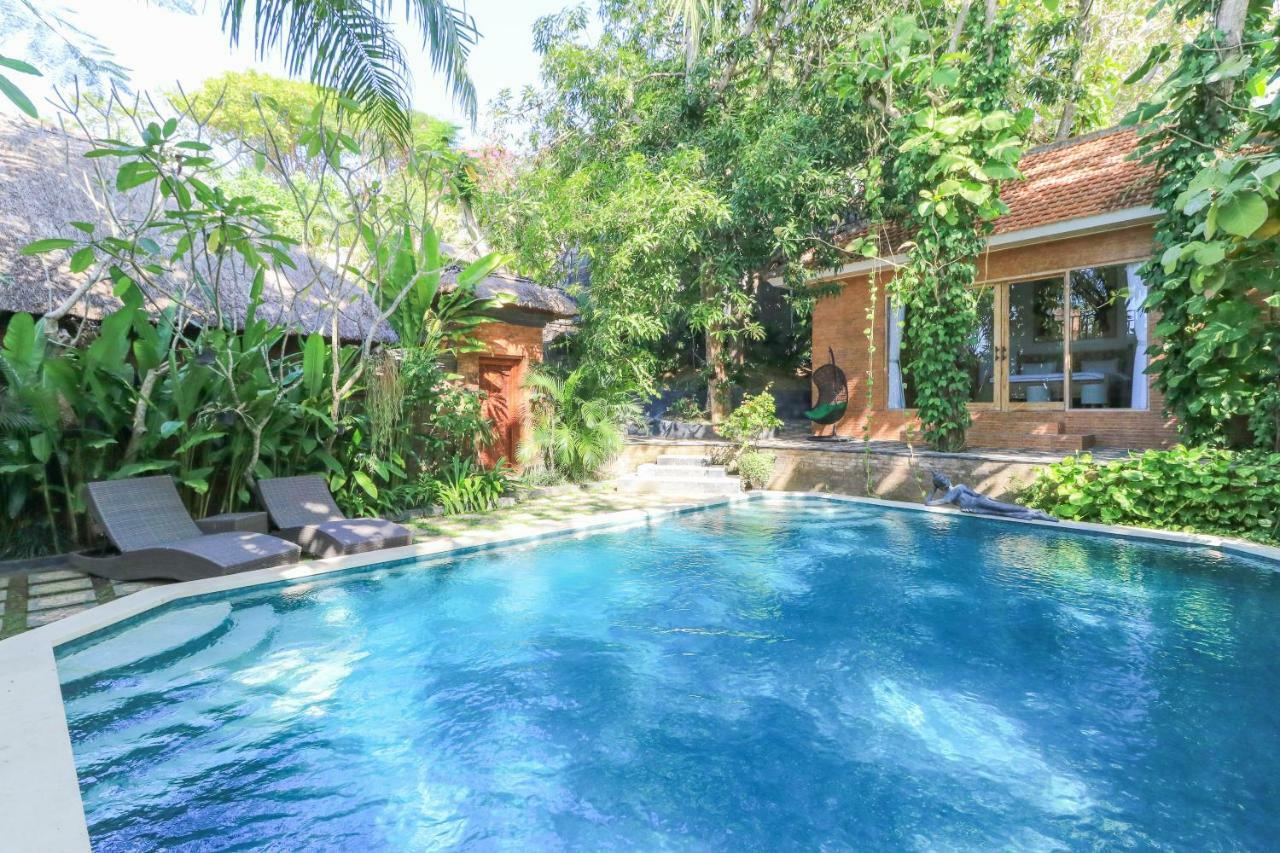 The Laras Villa Jimbaran Buitenkant foto