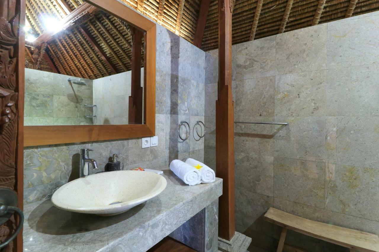 The Laras Villa Jimbaran Buitenkant foto